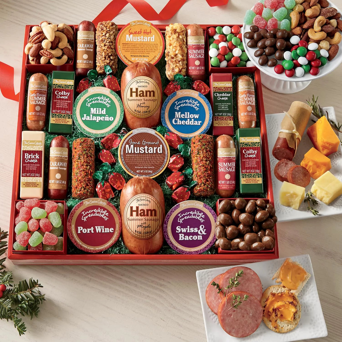 Assorted Holiday Treats with Ham Summer Sausages, Chocolates, Cheese Bars and Logs, and Candy A1755